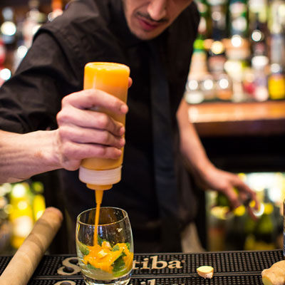 cocktail drink being made by bar staff