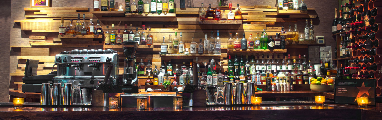 Drinks bar with a arrangement of cocktail drinks